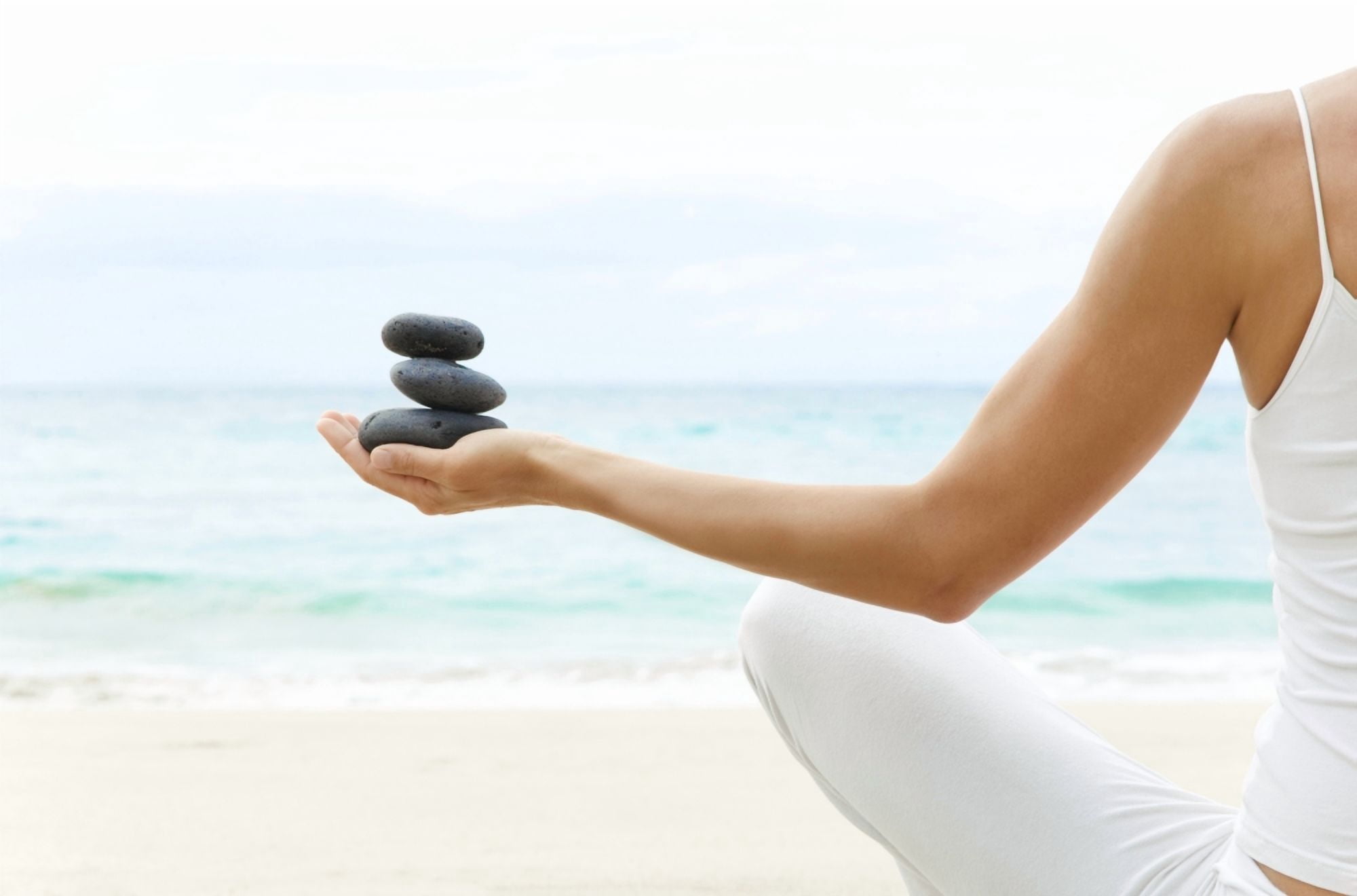 Hawaii Woman Holding Stack Of Stones In Hands Ocean In Background Canvas Art - M Swiet Productions Design Pics (36 x 24)