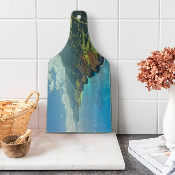 Hawaiian Cutting Board, Na Pali Coast on Kauai Island Water Sunshines Foggy Cloudscape Panorama, Decorative Tempered Glass Cutting and Serving Board, Wine Bottle Shape, Blue Green Brown, by Ambesonne