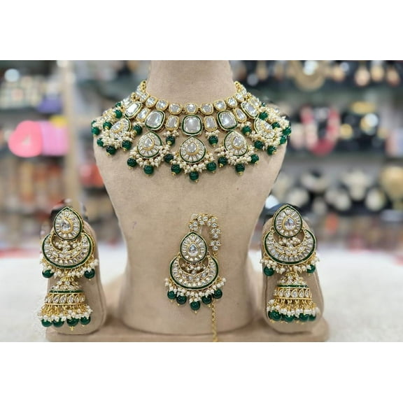 Haya Jewel South Indian Bollywood Royal Look White Kemp Stone Guttapusalu Kundan Choker Jewelry Set Gold Plated Matte Finish Brass with Green Pearls, Beads, Jhumki Earrings & Maangtikka