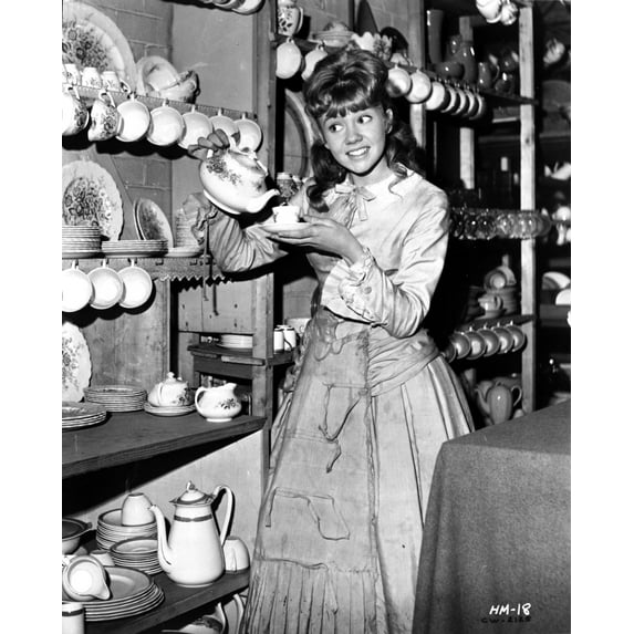 Hayley Mills wearing a Dress and Pouring a Tea in a Cup Photo Print (24 x 30)