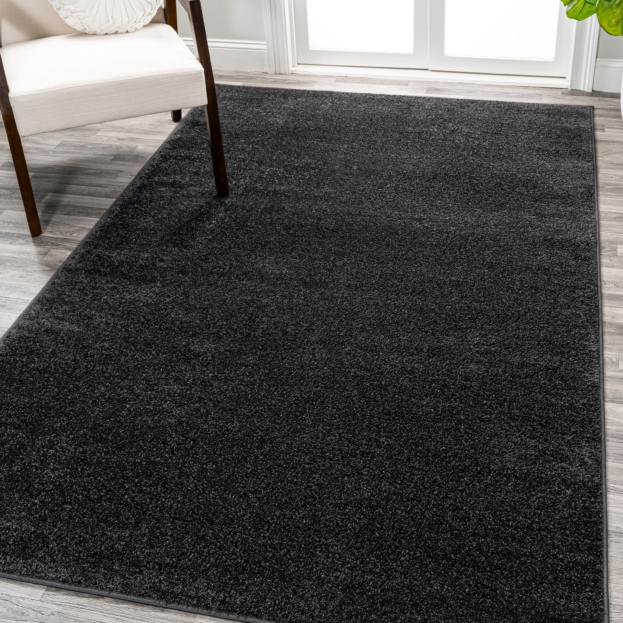 Haze Solid Black Synthetic Low-Pile Area Rug