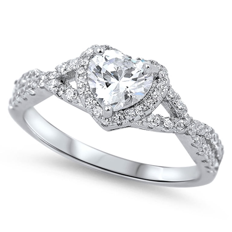 Heart Shaped Stone Surrounded By Round Cubic Zirconia Swirl Design 