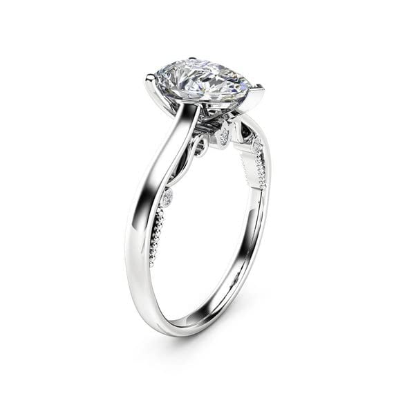 HeartsAndYou 1ct Pear Cut Moissanite Engagement Ring for Women 18k White Gold Over Silver Classic Solitaire