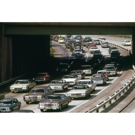 Heavy Rush Hour Traffic As Commuters Drive To Their Suburban Homes From Their Workplaces In Cleveland. Ca. 1973-75.