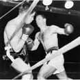 thumbnail image 1 of Heavyweight Champion Rocky Marciano Backs Roland Lastarza Against The Ropes. Sept. 24 History, 1 of 2