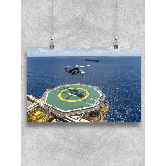 Helicopter Landing On Helipad. Poster -Image by Shutterstock