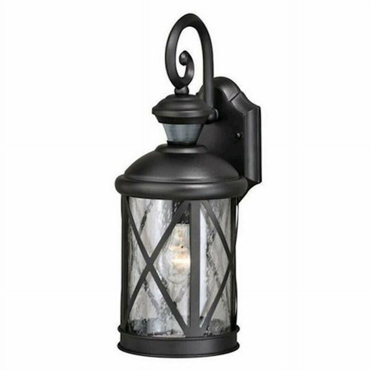 Textured Black Steel Outdoor Lantern Sconce with Seeded Glass