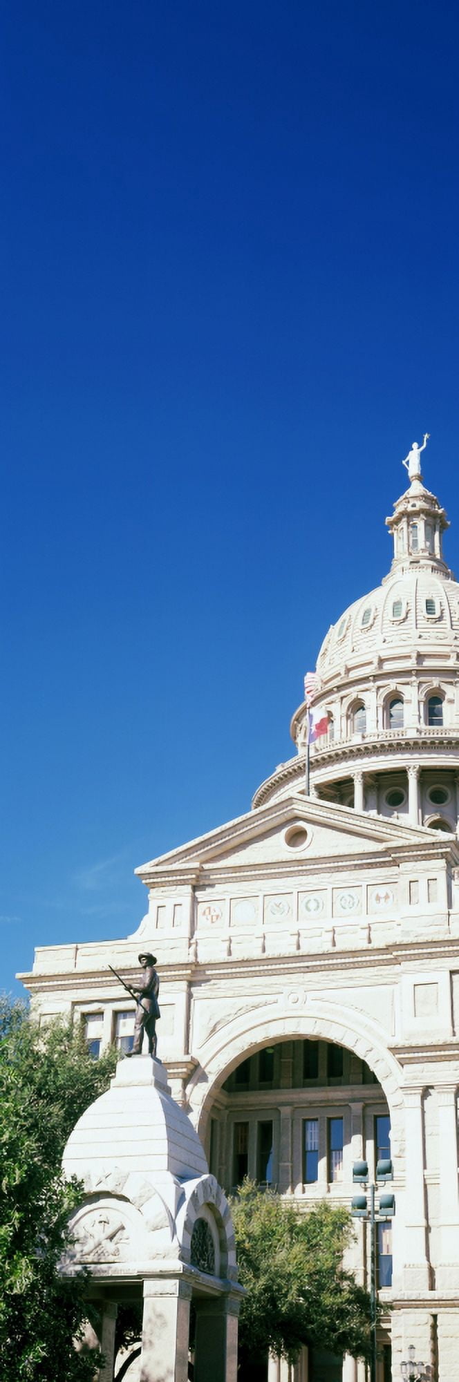 Heroes of the Alamo Memorial with a government building in the background Texas State Capitol Austin Texas USA Canvas Art - Panoramic Images (27 x 9)