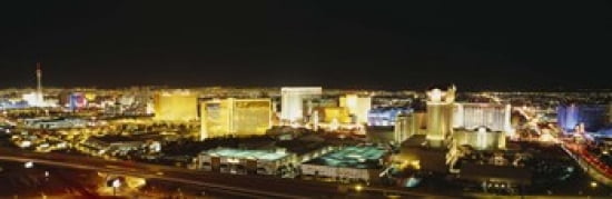 High Angle View Of Buildings Lit Up At Night Las Vegas Nevada USA Canvas Art - Panoramic Images (36 x 12)