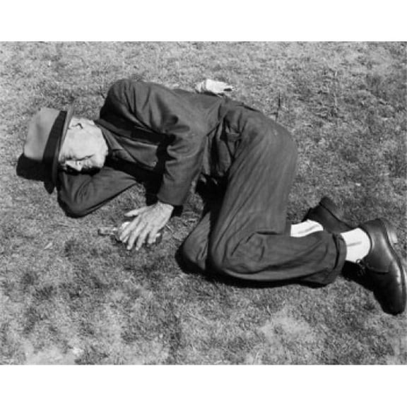 High Angle View of a Drunk Homeless Senior Man Passed Out Poster Print - 18 x 24 in.