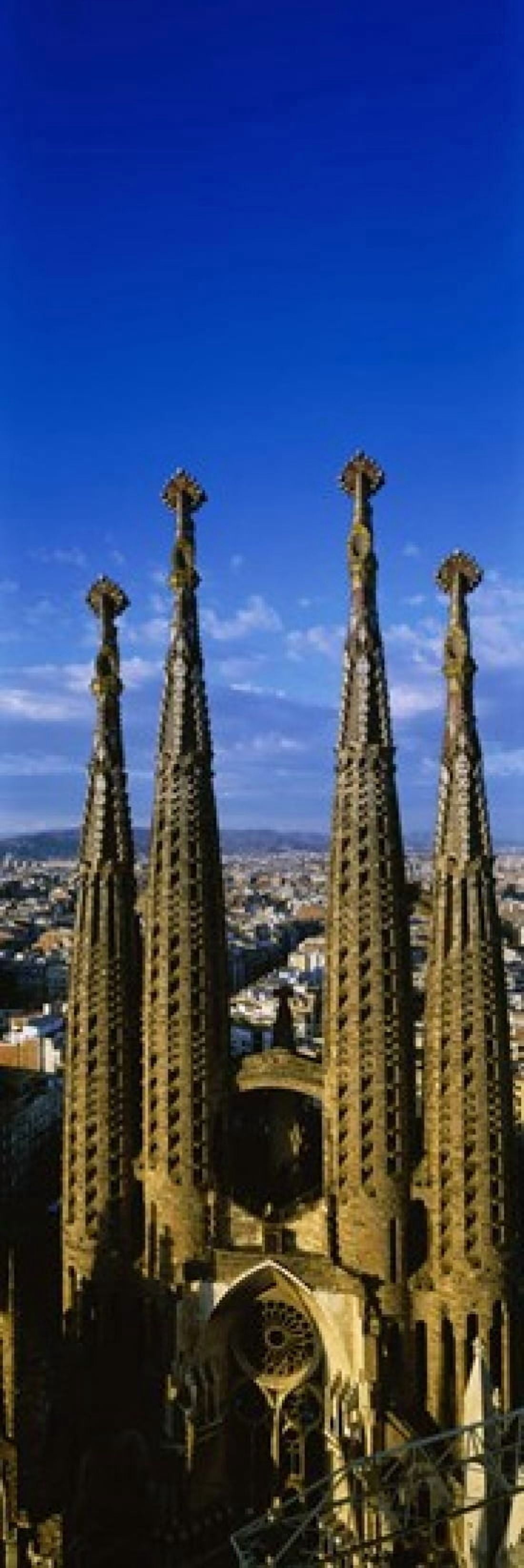 High Section View Of Towers Of A Basilica Sagrada Familia Barcelona Catalonia Spain Canvas Art - Panoramic Images (18 x 6)