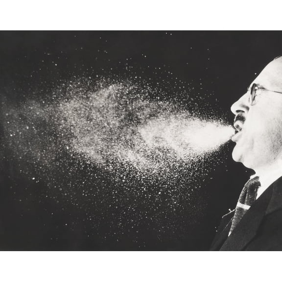 High Speed Strobe Photograph Of A Cloud Of Droplets 'Stopped' In Full Flight During A Sneeze. Most Of The Moisture In