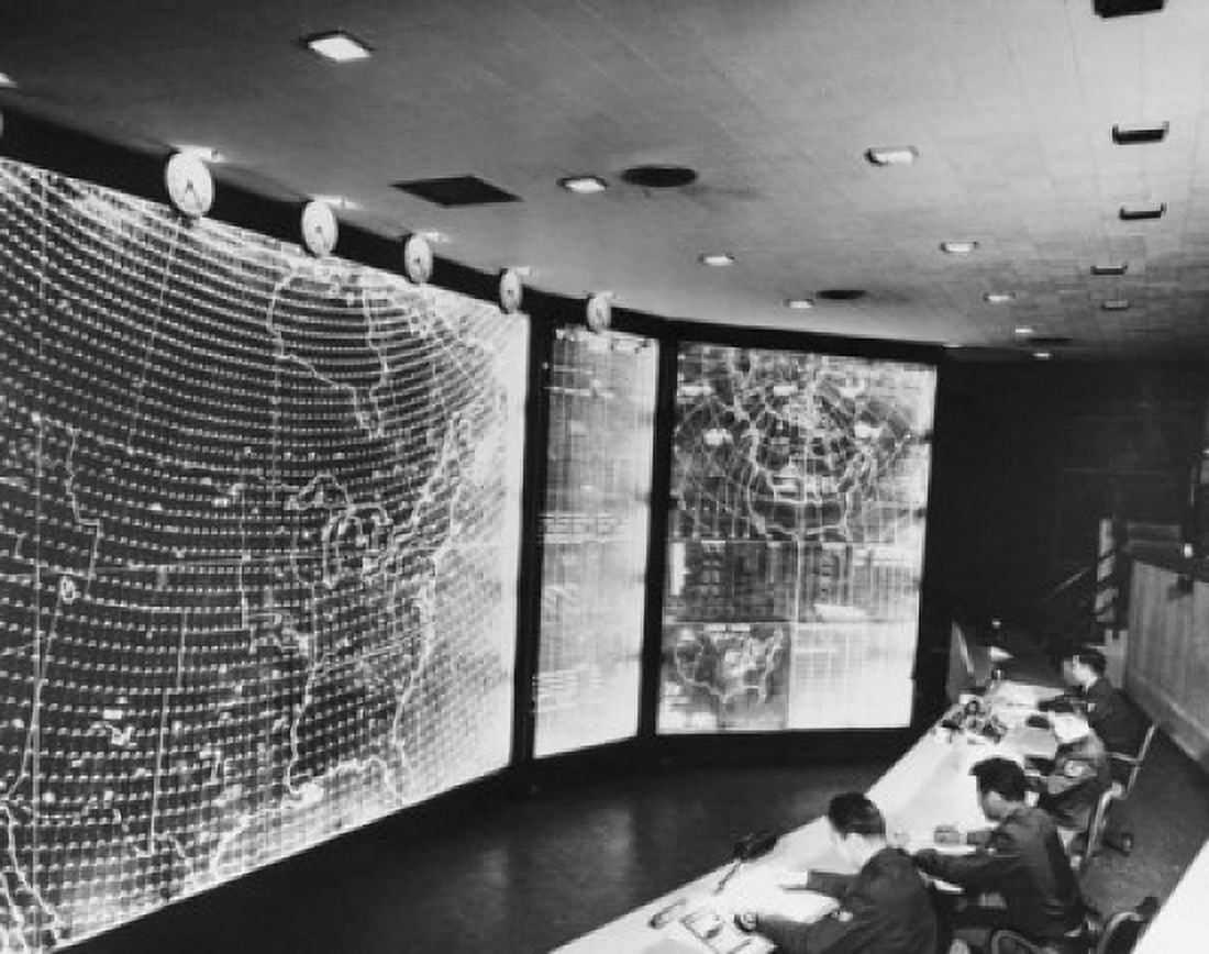 High angle view of four men sitting in a control room North American Aerospace Defense Combat Operations Center Colorado Springs Colorado USA Canvas Art - (24 x 36)
