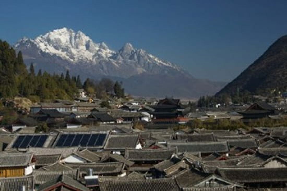 High angle view of houses with Jade Dragon Snow Mountain in the background Old Town Lijiang Yunnan Province China Canvas Art - Panoramic Images (36 x 24)