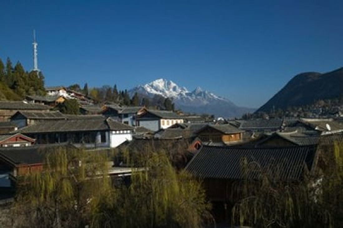 High angle view of houses and Jade Dragon Snow Mountain viewed from Mu Family Mansion Old Town Lijiang Yunnan Province China Canvas Art - Panoramic Images (36 x 24)