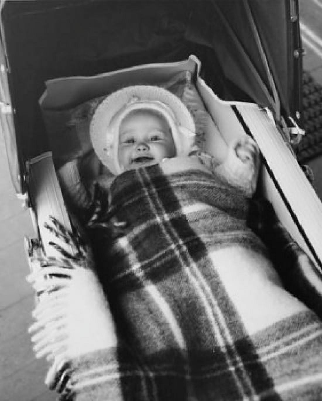 High angle view of a baby girl lying in a baby carriage Canvas Art - (18 x 24)