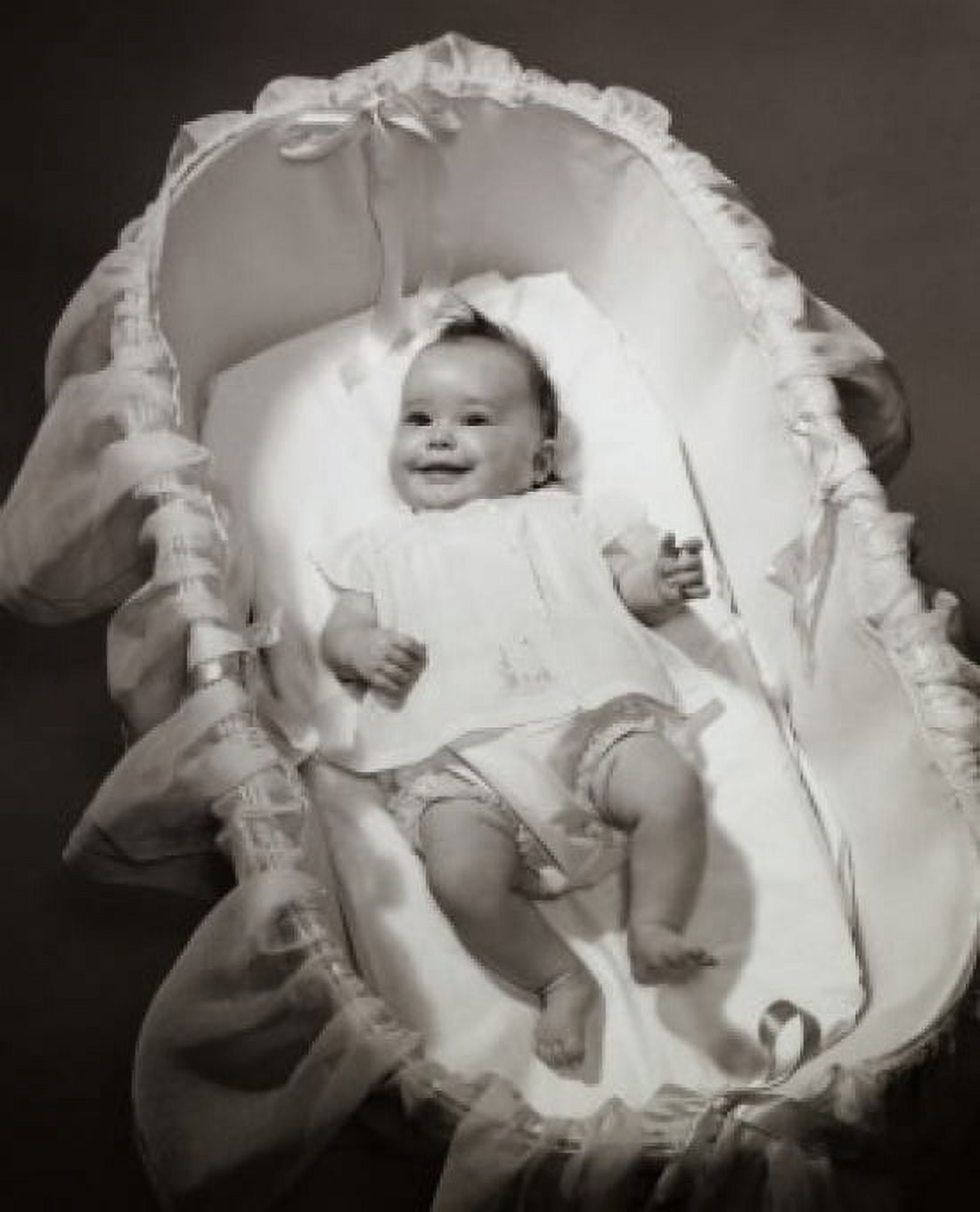 High angle view of a baby girl lying in a bassinet Canvas Art - (24 x 36)