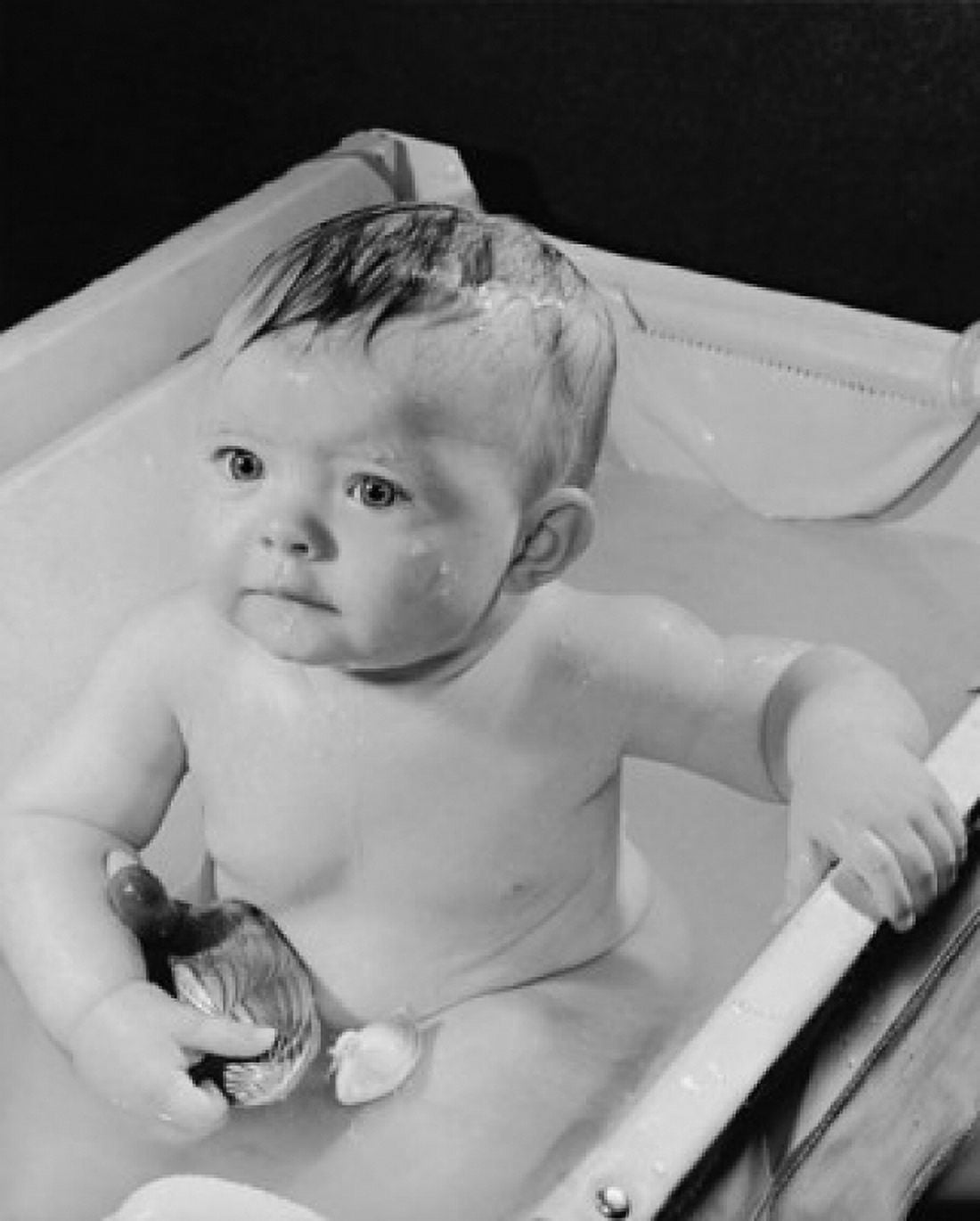 High angle view of a baby in a bathtub Canvas Art - (24 x 36)