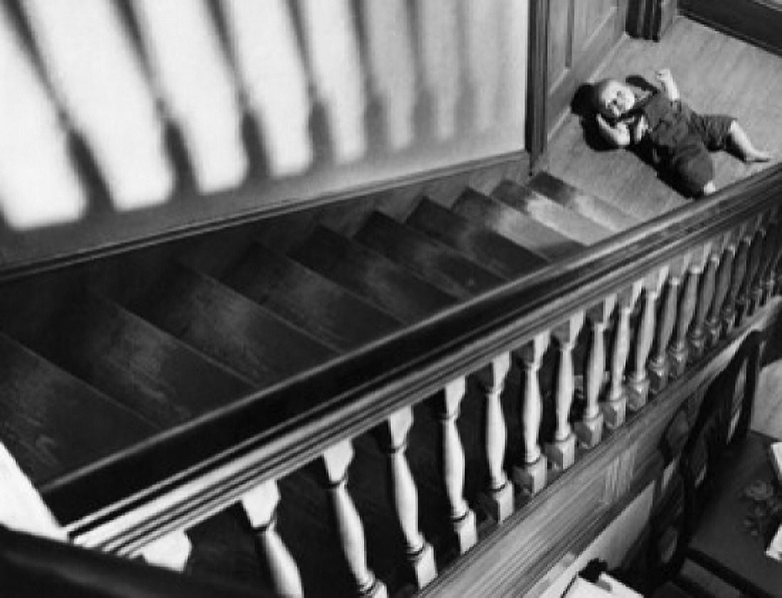 High angle view of a baby lying near a staircase Canvas Art -  (24 x 36)