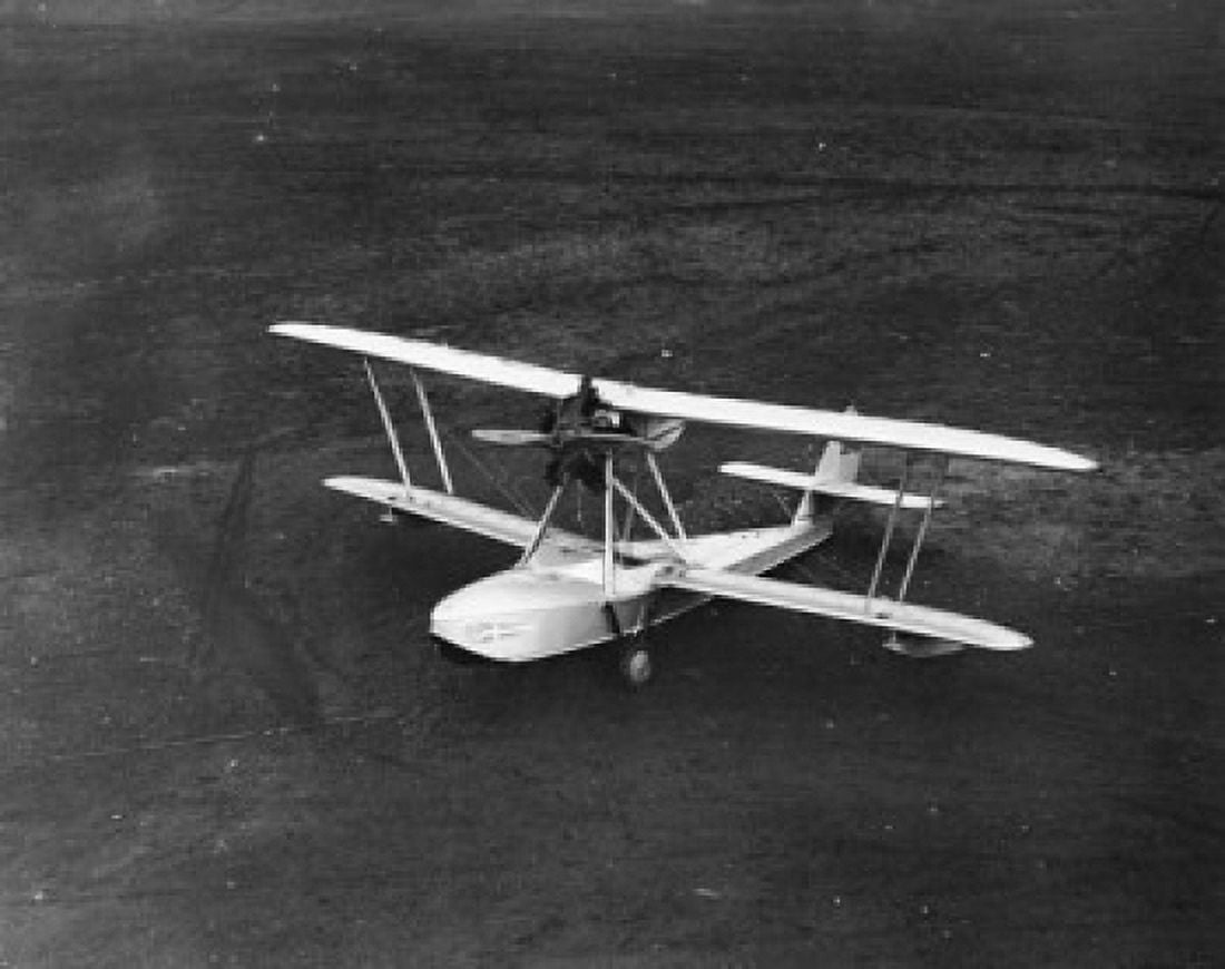 High angle view of a biplane Canvas Art -  (24 x 36)