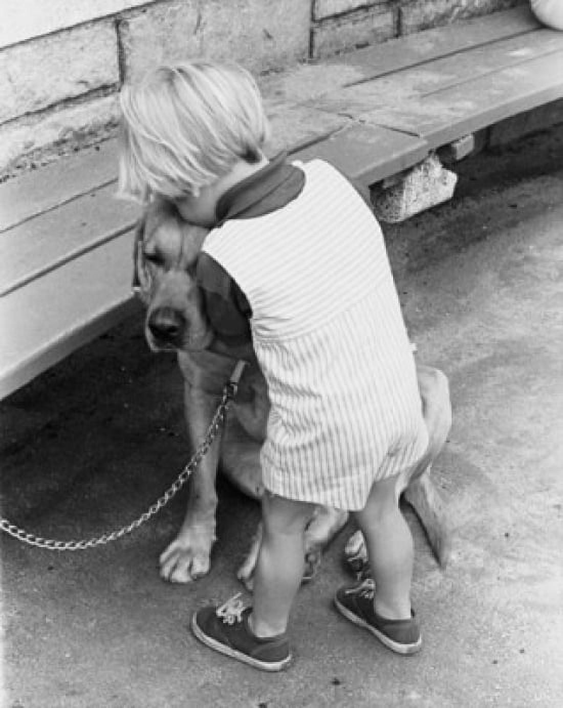High angle view of a boy kissing his dog Canvas Art - (18 x 24)