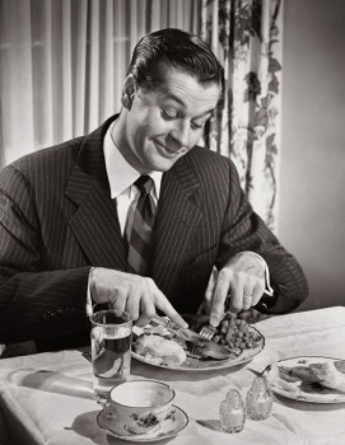 High angle view of a businessman eating food Canvas Art - (18 x 24)