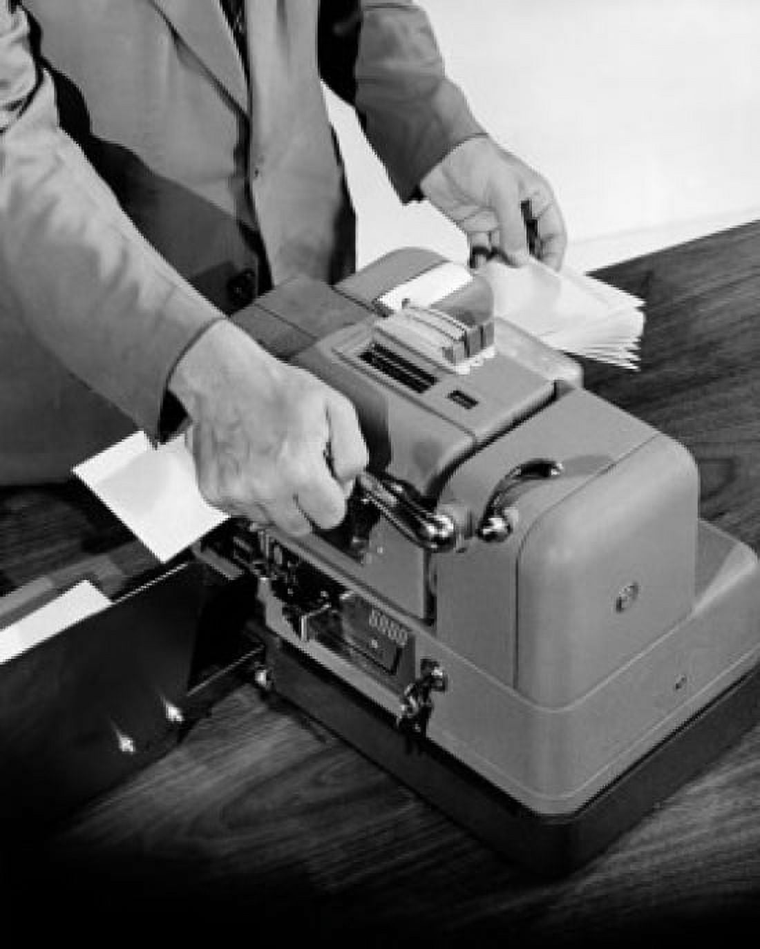 High angle view of a businessman using a lamination machine Canvas Art - (18 x 24)