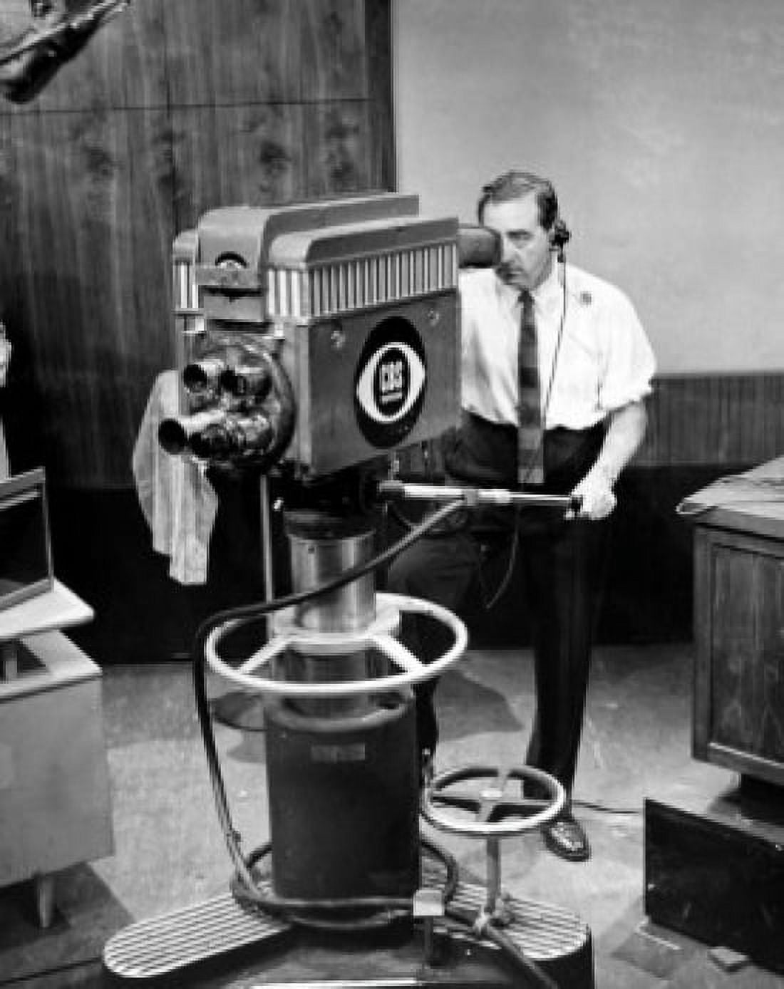 High angle view of a cameraman operating a television camera Canvas Art - (24 x 36)