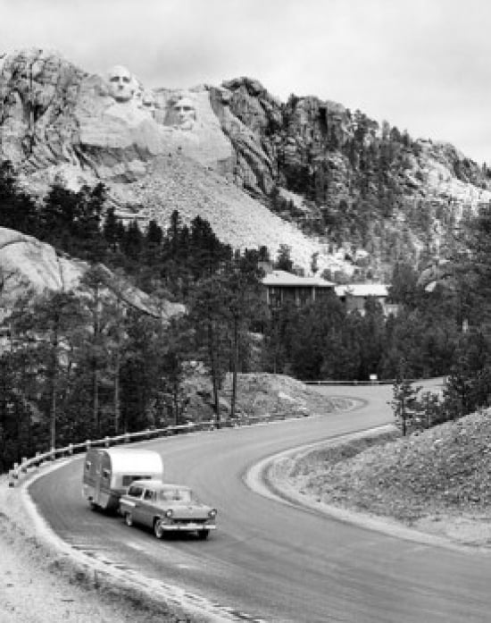 High angle view of a camper attached to a car moving on a road Mt Rushmore South Dakota USA Canvas Art - (18 x 24)