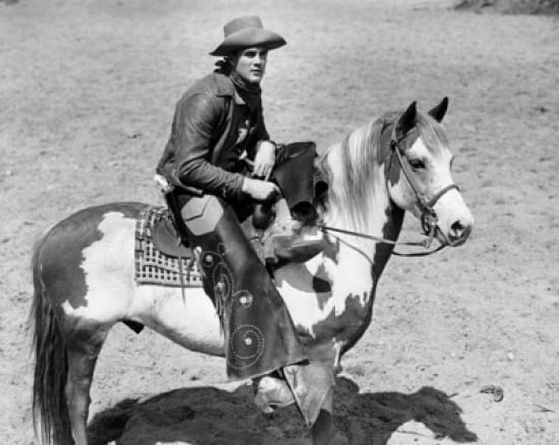 High angle view of a cowboy riding on a horse Canvas Art - (24 x 36)