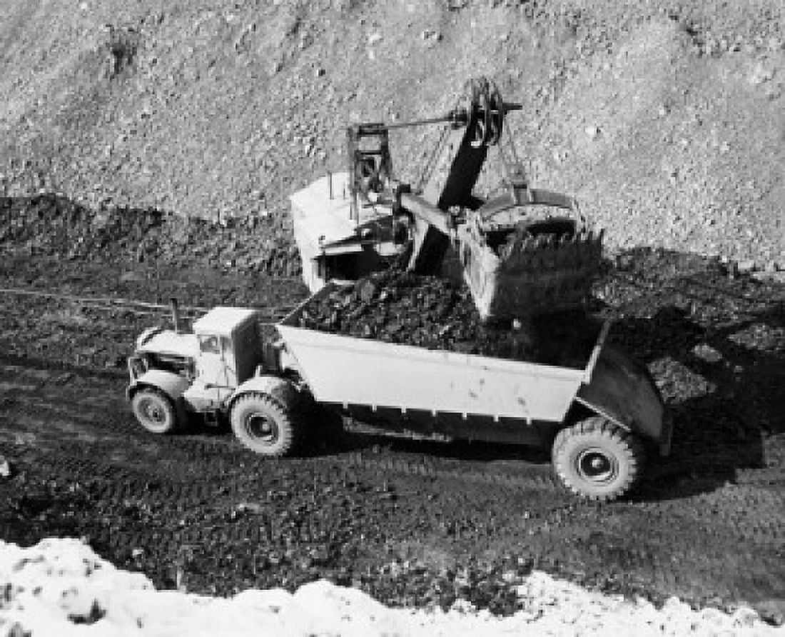 High angle view of a crane loading coal into a dump truck Canvas Art - (24 x 36)