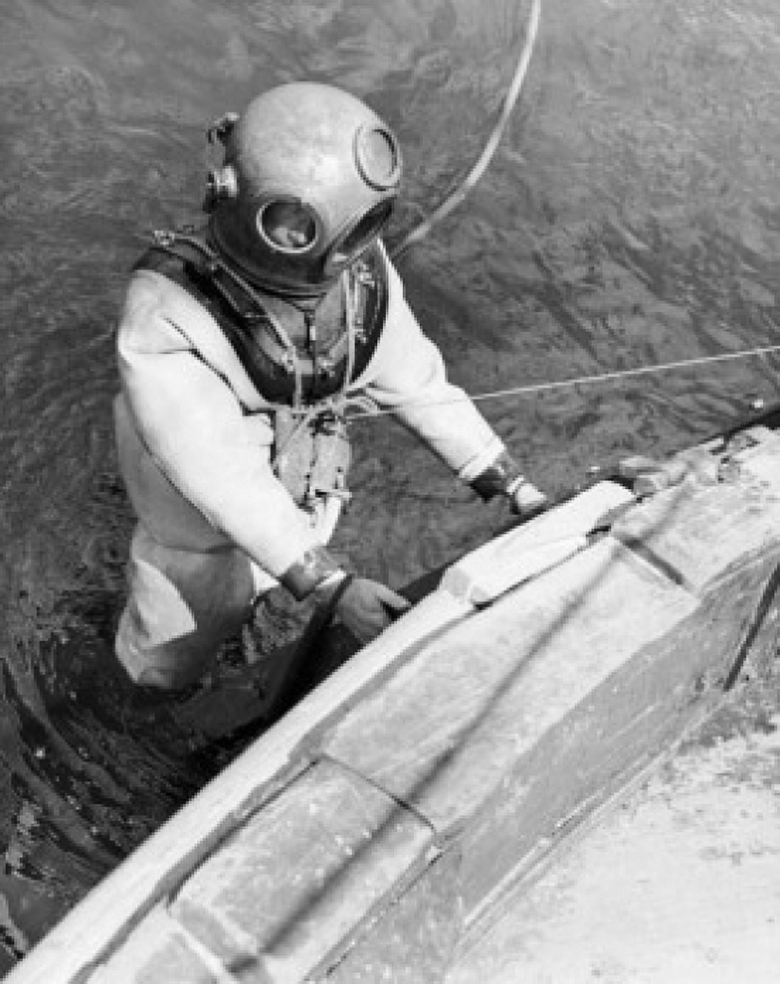 High angle view of a diver in the water next to a boat Canvas Art - (24 x 36)