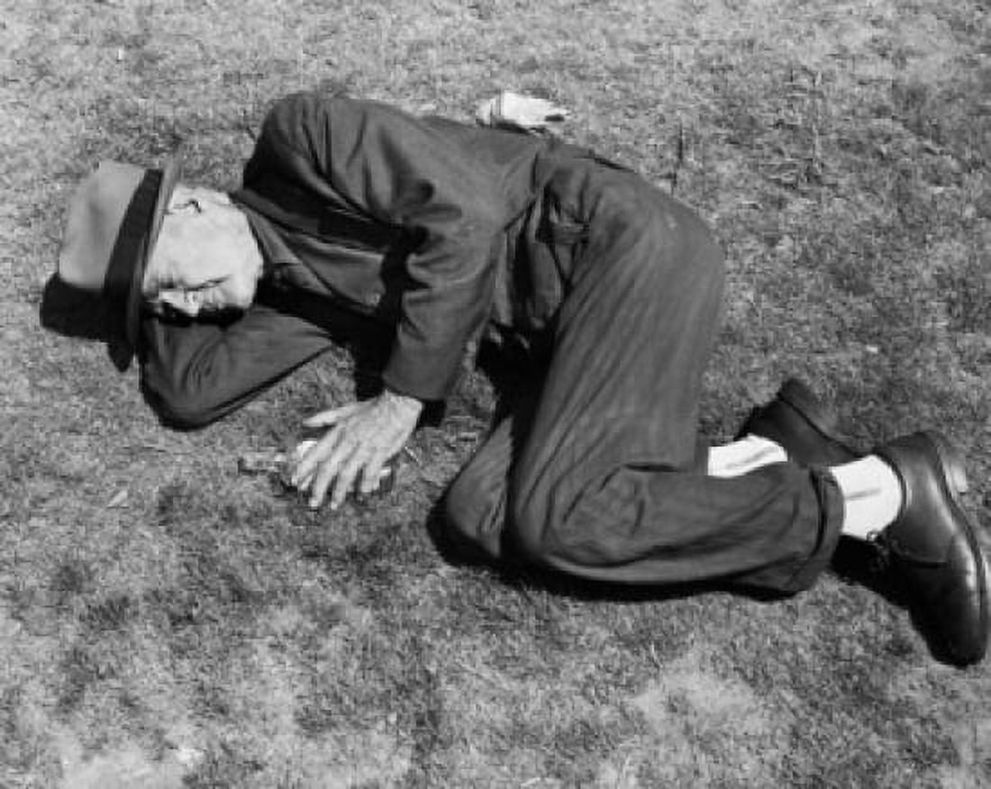 High angle view of a drunk homeless senior man passed out Canvas Art - (18 x 24)
