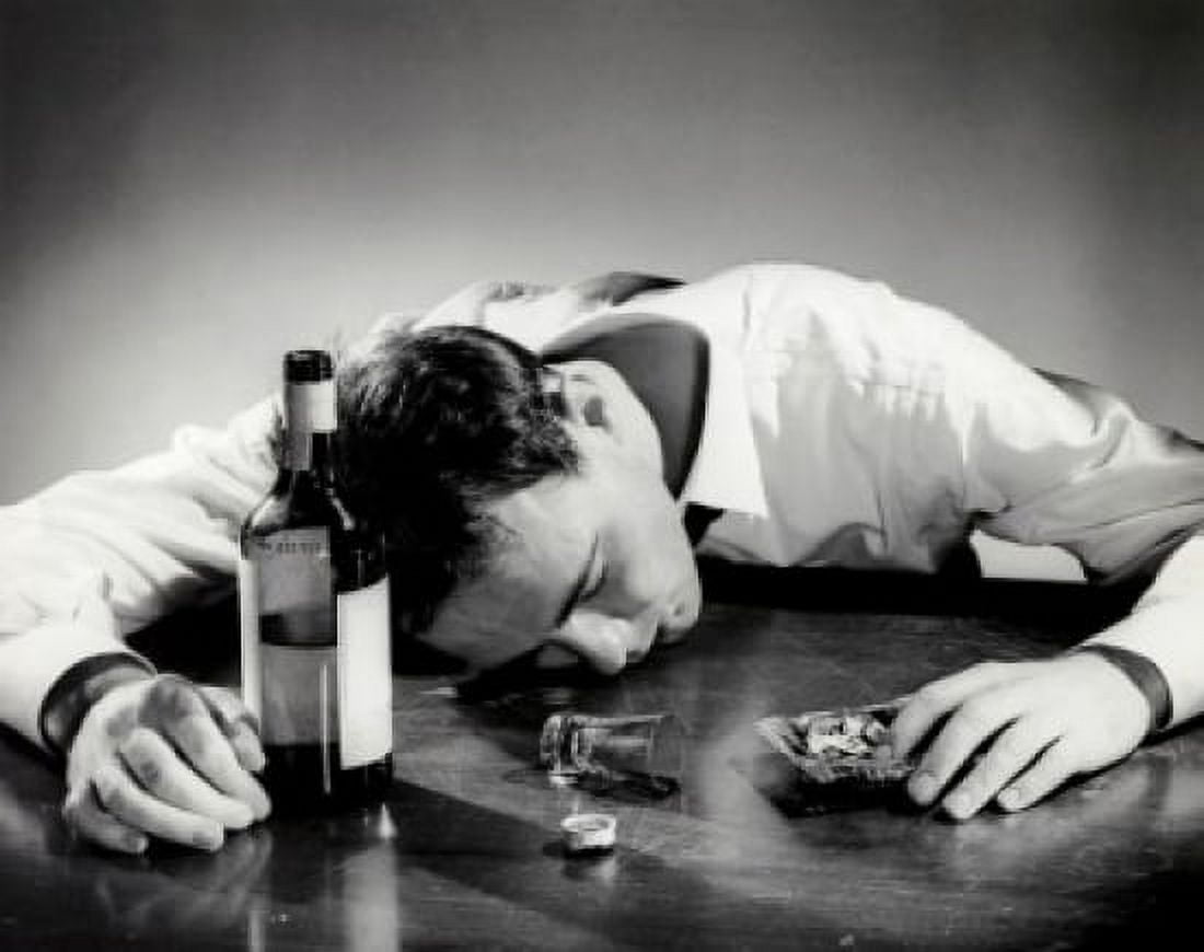 High angle view of a drunk mid adult man passed out Canvas Art - (24 x 36)