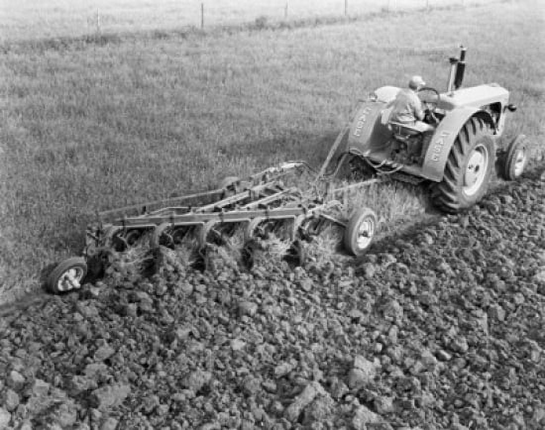 High angle view of a farmer plowing a field with a tractor Itasca Illinois USA Canvas Art - (24 x 36)