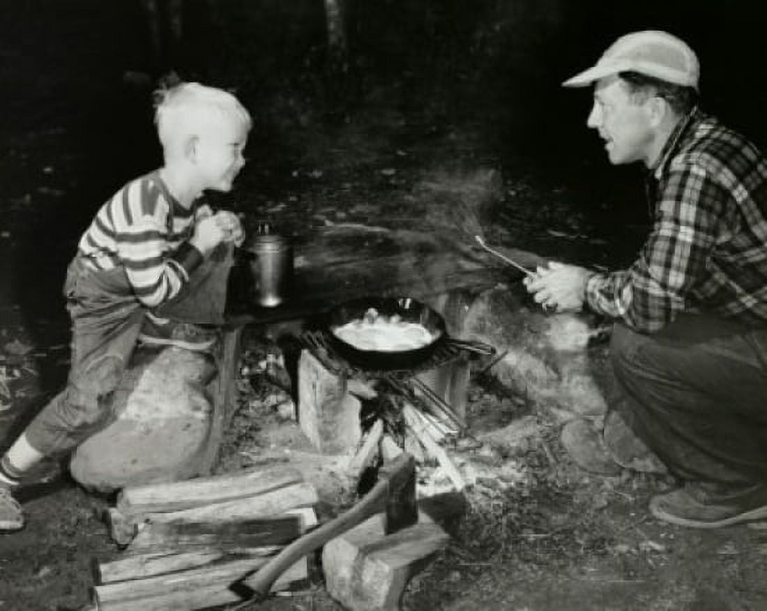 High angle view of a father and his son cooking on a camping trip Canvas Art - (18 x 24)