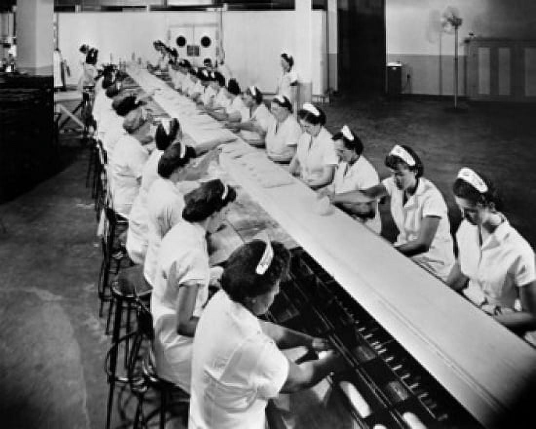 High angle view of a group of female workers working in a bread factory Canvas Art - (18 x 24)