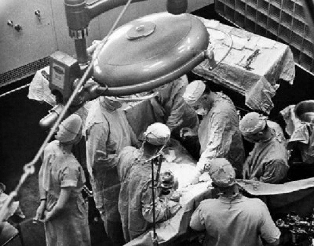 High angle view of a group of surgeons in an operating room Canvas Art - (18 x 24)