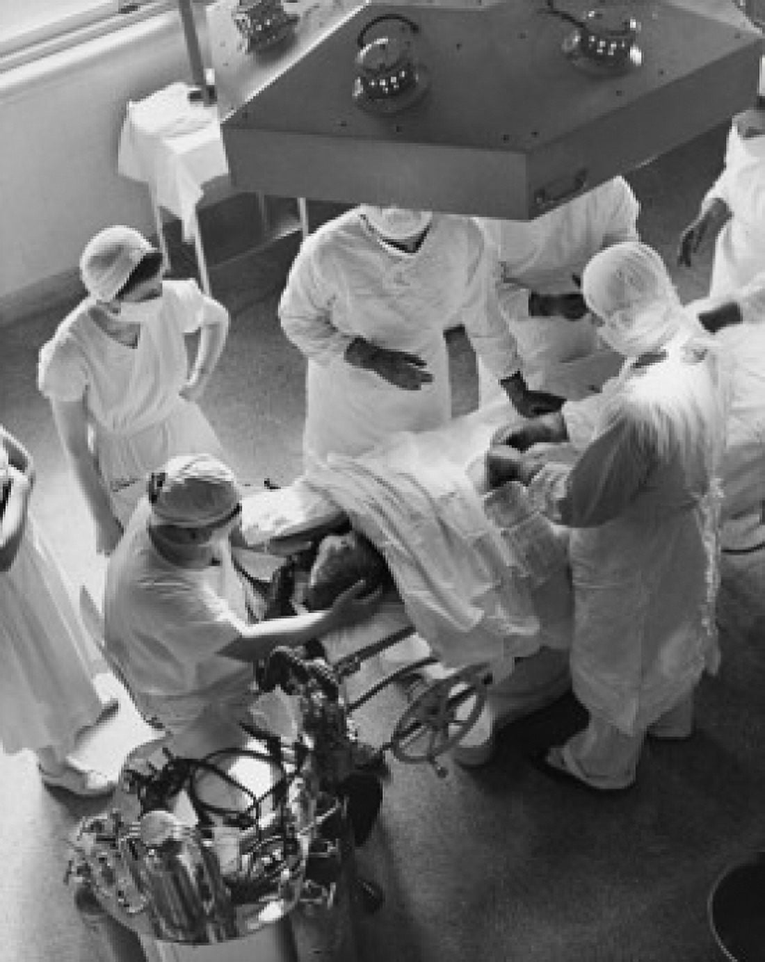 High angle view of a group of surgeons performing an operation in an operating room Canvas Art - (18 x 24)