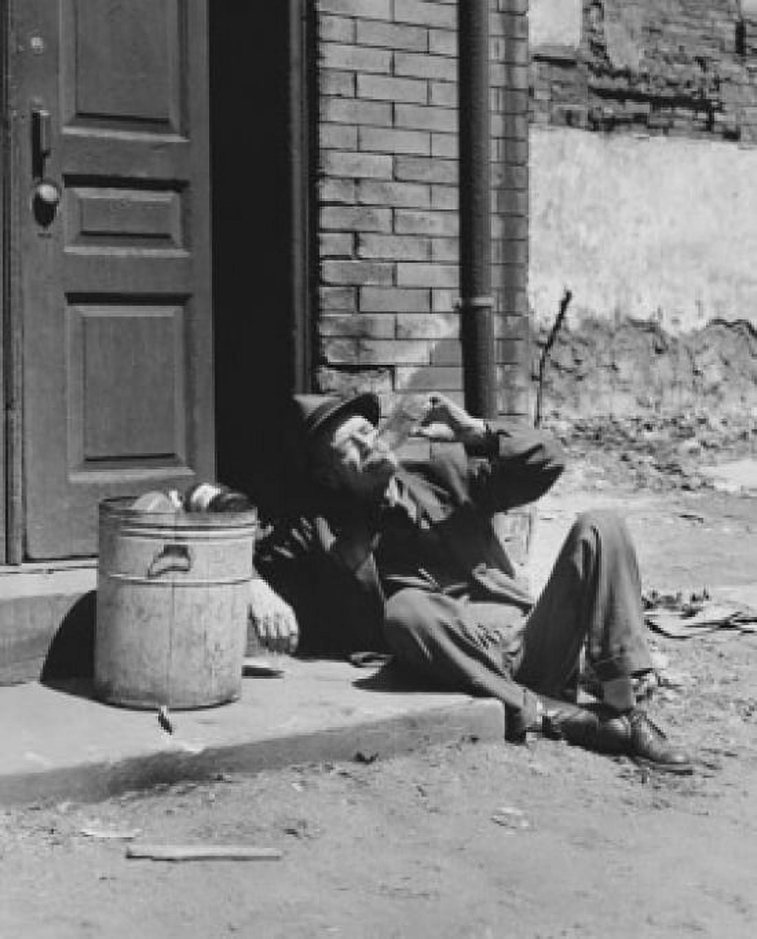 High angle view of a homeless senior man drinking alcohol sitting near a garbage can Canvas Art - (18 x 24)