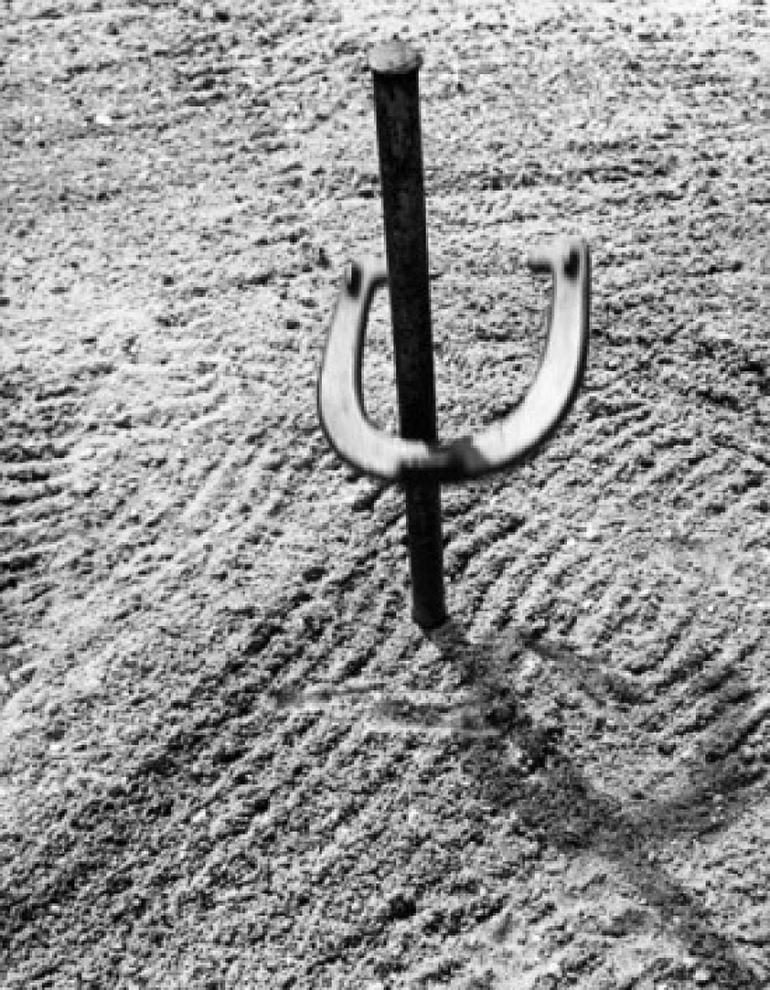 High angle view of a horseshoe on a stake Canvas Art - (18 x 24)