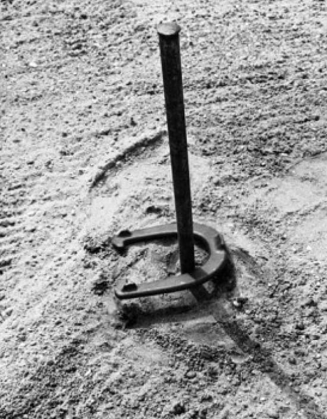 High angle view of a horseshoe on a stake Poster Print (18 x 24