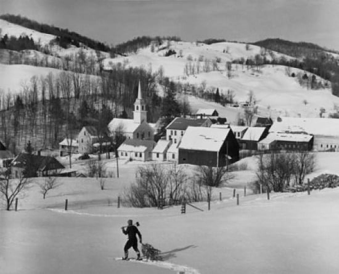 High angle view of a man pulling a Christmas tree on snow Canvas Art - (24 x 36)