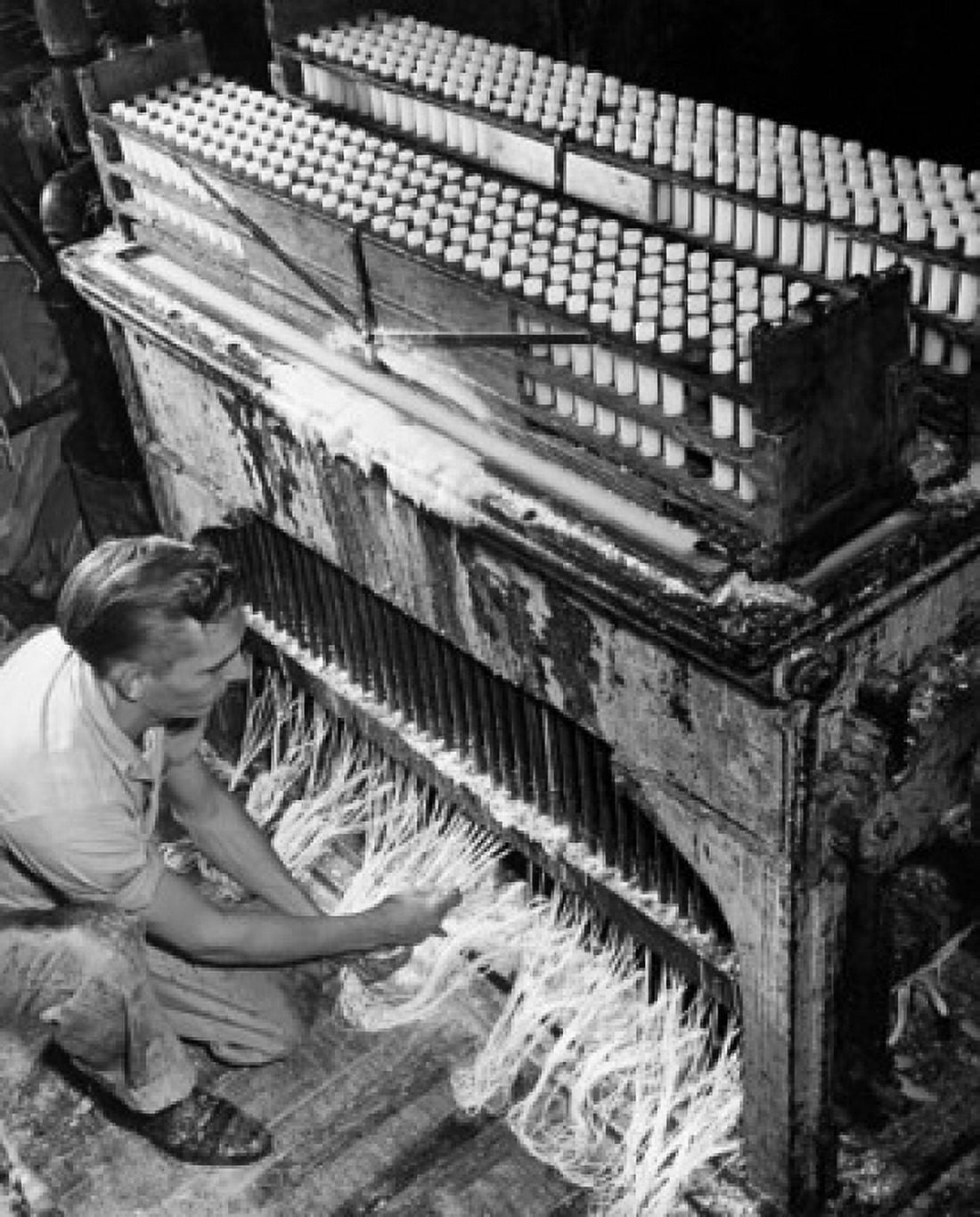 High angle view of a manual worker working in a candle factory Canvas Art - (18 x 24)