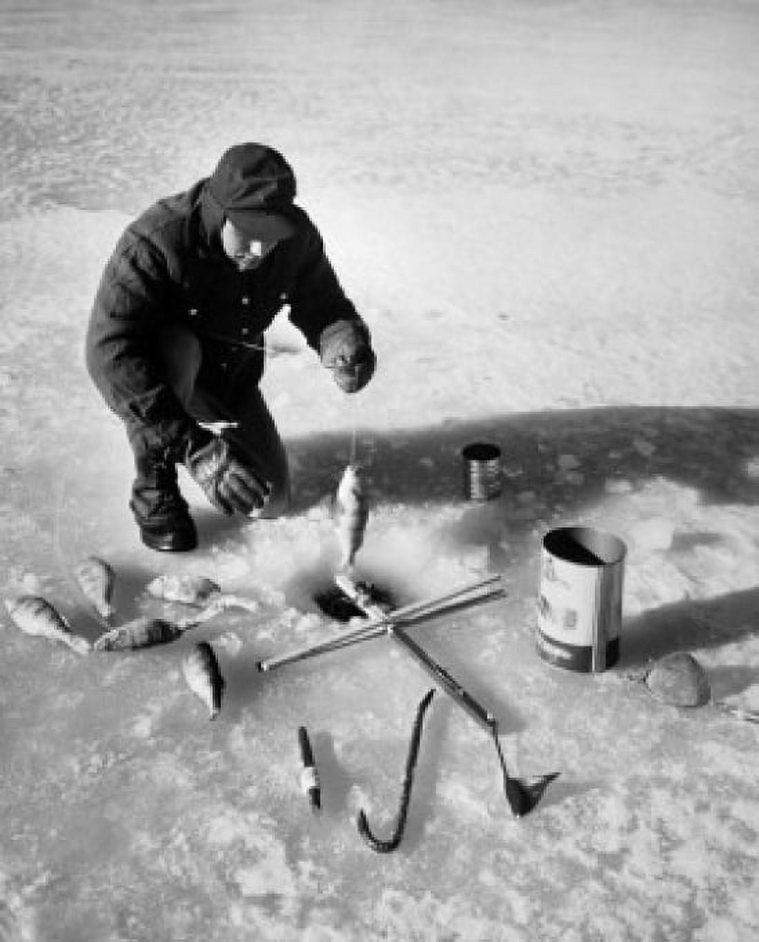 High angle view of a mid adult man fishing on ice Canvas Art - (24 x 36)