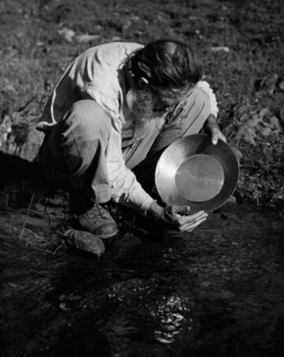 High angle view of a miner panning for gold Canvas Art - (18 x 24)