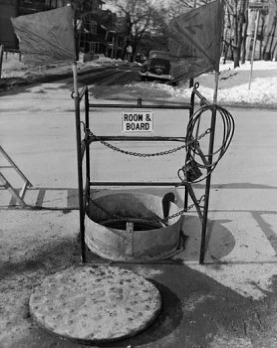 High angle view of a sign on a manhole Canvas Art - (18 x 24)