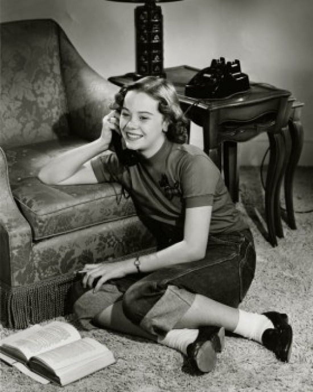 High angle view of a teenage girl talking on the telephone Canvas Art - (18 x 24)