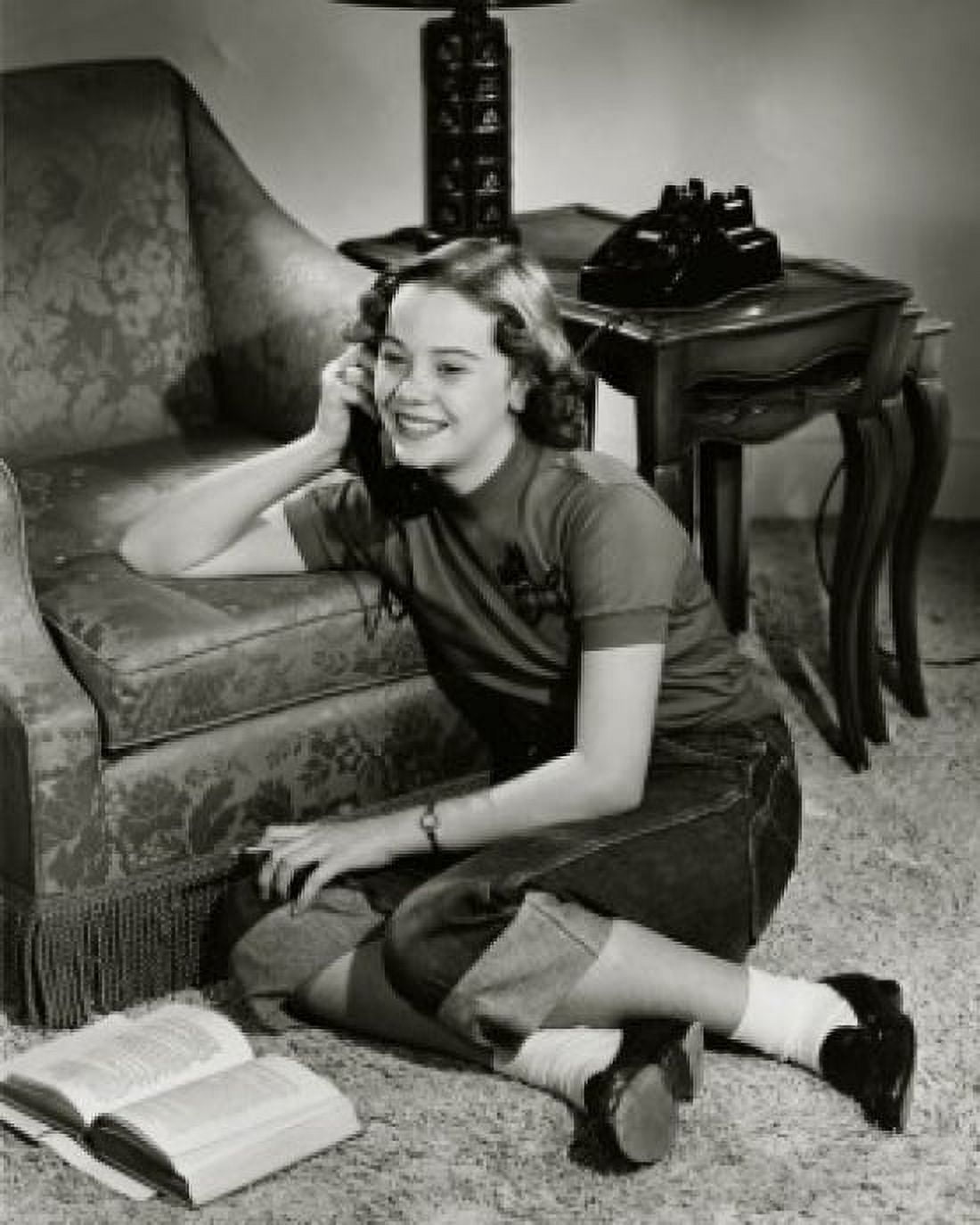 High angle view of a teenage girl talking on the telephone Canvas Art - (24 x 36)