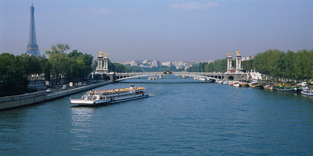 High angle view of a tourboat in a river Seine River Paris France Canvas Art - Panoramic Images (36 x 12)